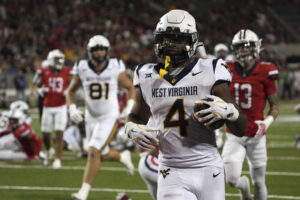 WVU gambles pay off in the desert, as Mountaineers hold off Arizona